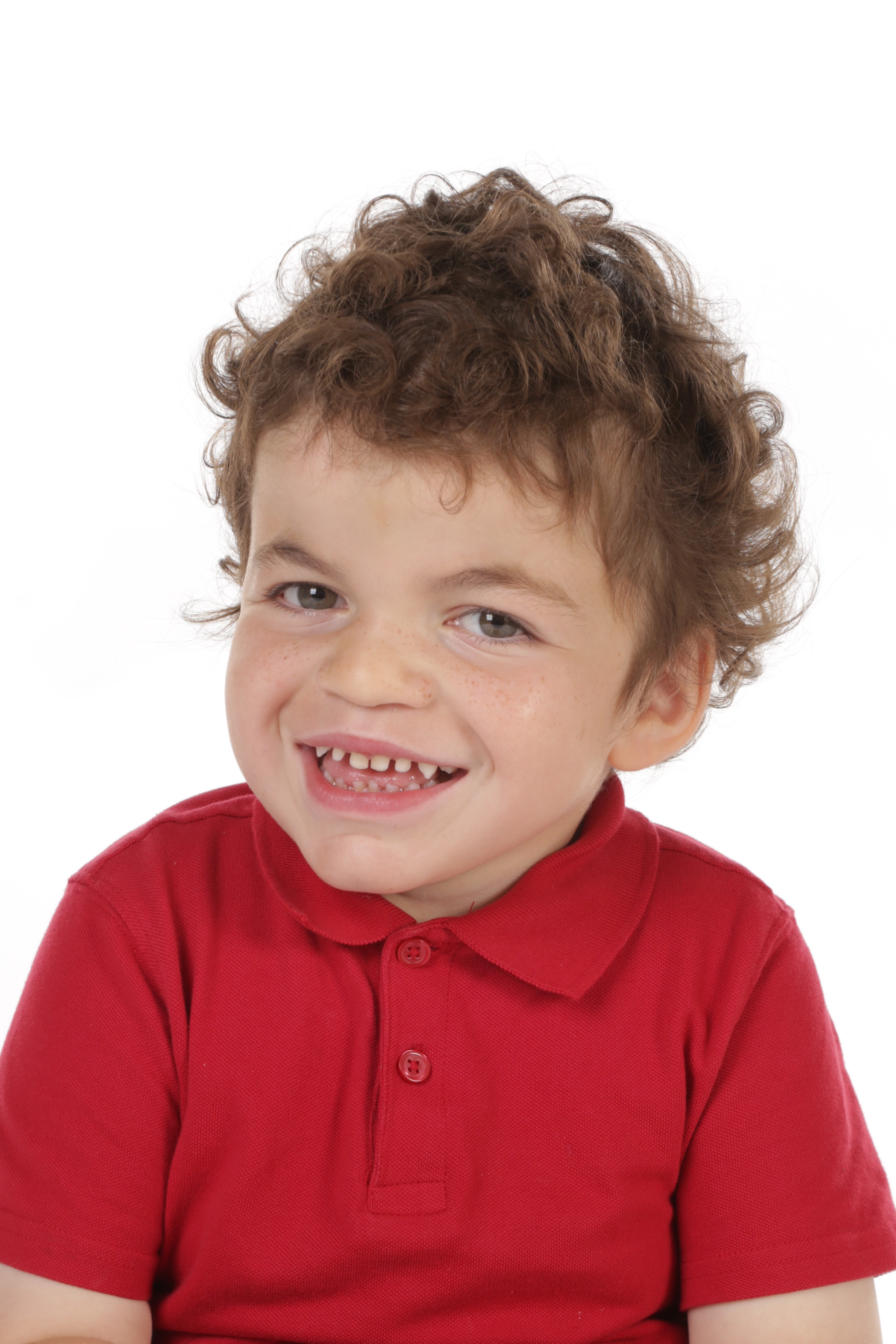 Pudding smiling widely in his red school shirt.