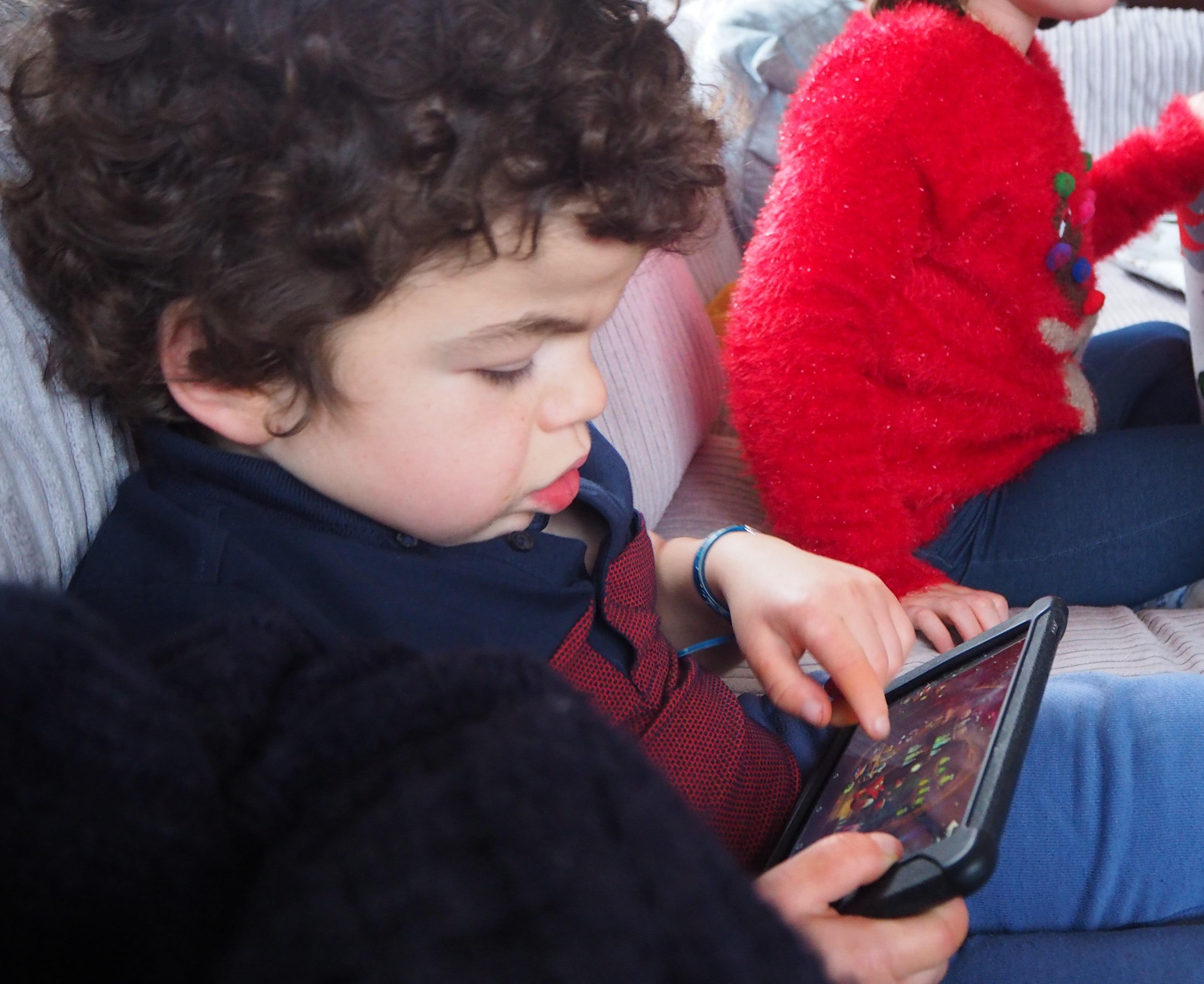 Pudding watching a film on his tablet