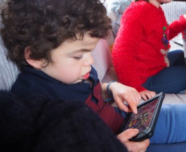 Pudding watching a film on his tablet